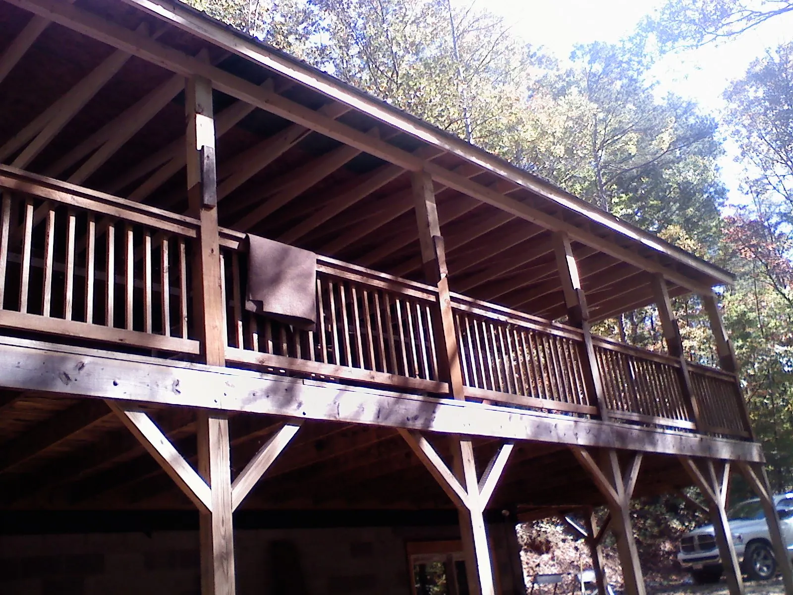 Timber framing under a new elevated porch and deck — Roof Leak Repair in Keystone Heights by Roofing Brothers